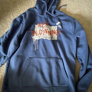 Blue Hoodie with 'New Beginnings' Design